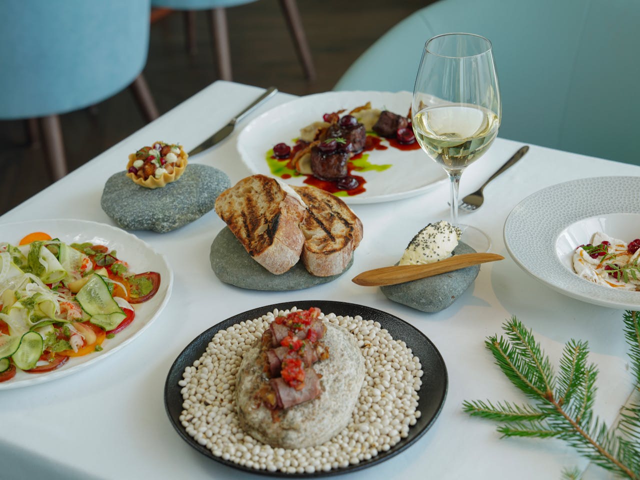 Crafting Captivating Headlines: Your awesome post title goes here A luxurious dining setup with gourmet dishes and a glass of white wine.